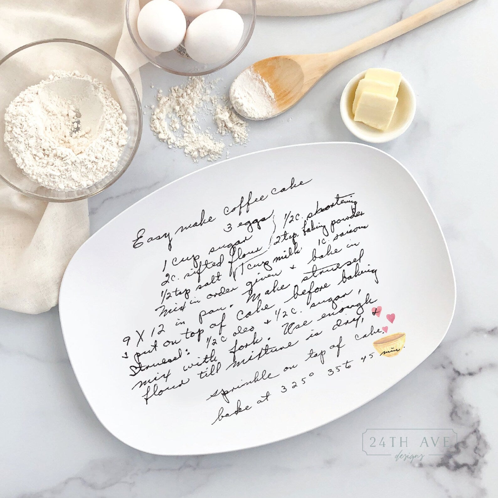 Custom handwritten recipe platter featuring original family handwriting with heart bowl detail, styled with baking ingredients.