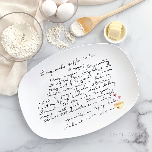 Custom handwritten recipe platter featuring original family handwriting with heart bowl detail, styled with baking ingredients.