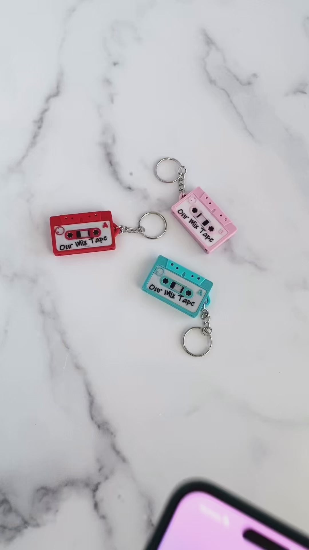 Demo of NFC mixtape keychain opening a custom Spotify playlist when tapped with a smartphone