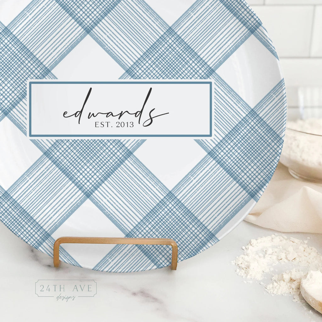 Close up of personalized blue plaid family name plate with established date