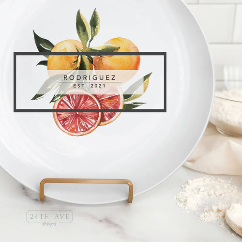 Close up of citrus personalized family name plate with established year detail