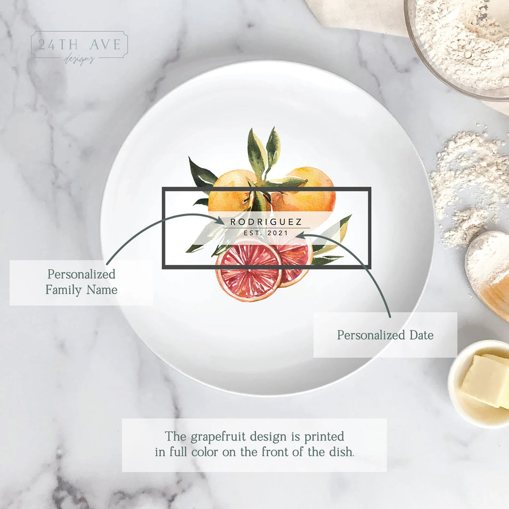 Top view of citrus family name plate with custom last name and established date in kitchen setting