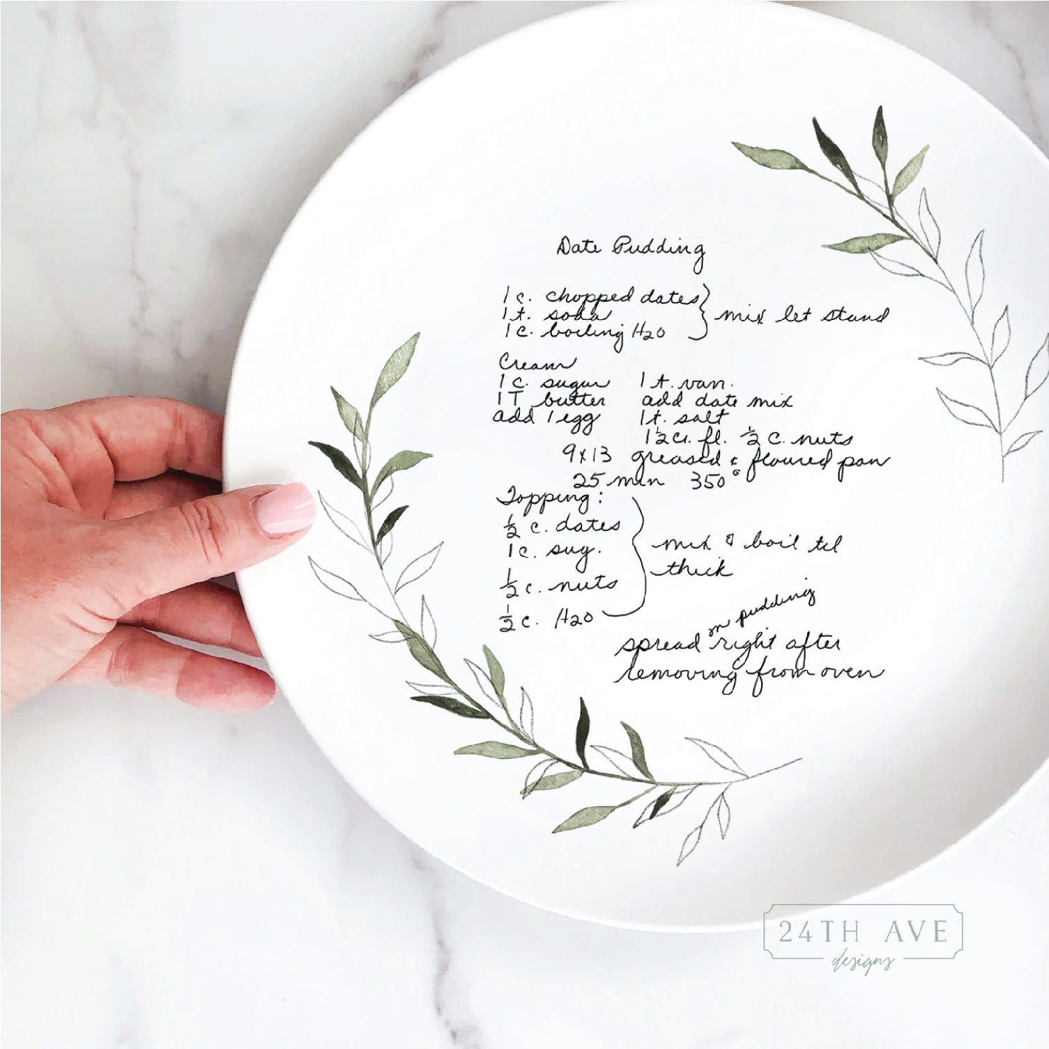 closeup of handwritten recipe plate with greenery leaf accent and family recipe handwriting