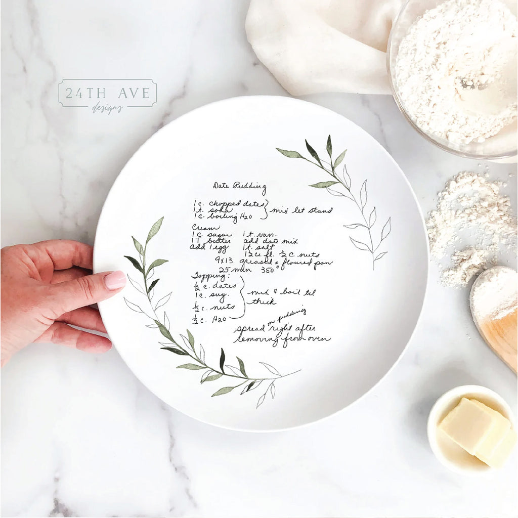 handheld handwritten recipe plate with greenery leaf accent and family recipe in original handwriting